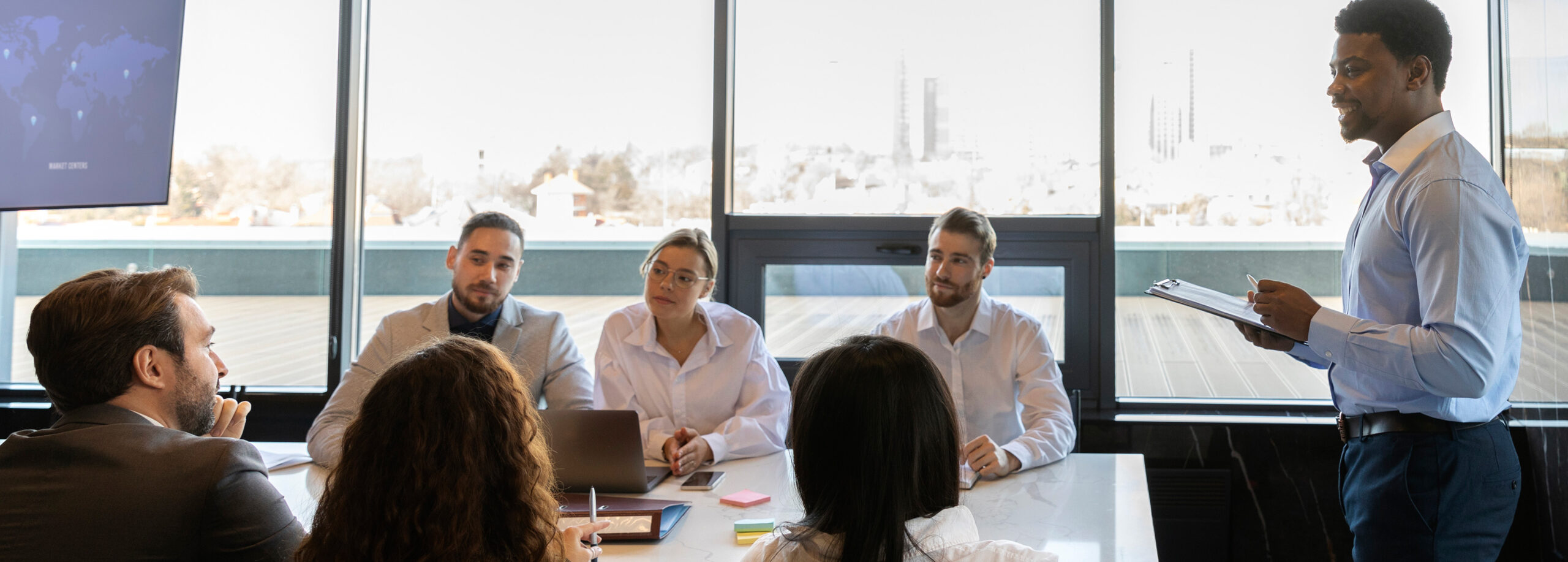 TIP-Header-people-taking-part-business-event